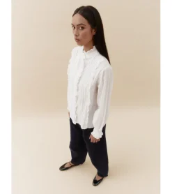 BLUSA ALFORZAS VOLANTES
