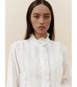 BLUSA ALFORZAS VOLANTES