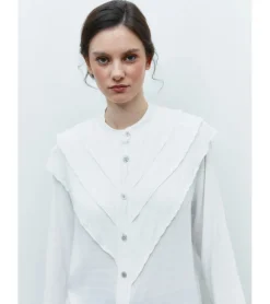 BLUSA BOTONES CON VOLANTES