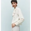 BLUSA BOTONES LATERALES