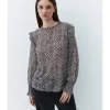 BLUSA ESTAMPADA VOLANTE