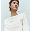 BLUSA VOLANTE
