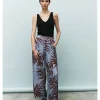 PANTALÓN SATÉN HOJAS